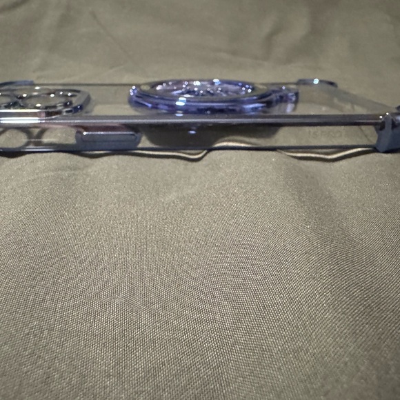 Clear Phone Case with Blue Accents For a 15 Pro Max. Spinning wheel in Center. - Picture 8 of 14